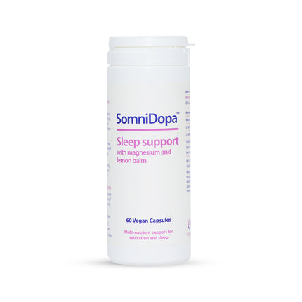 SomniDopa sleep support supplement container on a white background